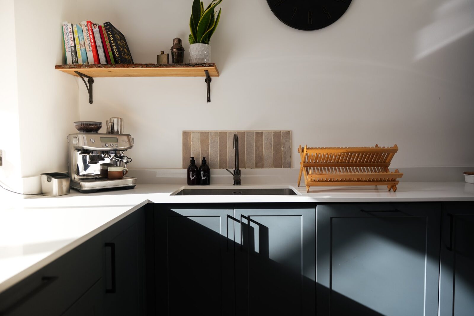 Kitchen detail with espresso machine and cookbooks