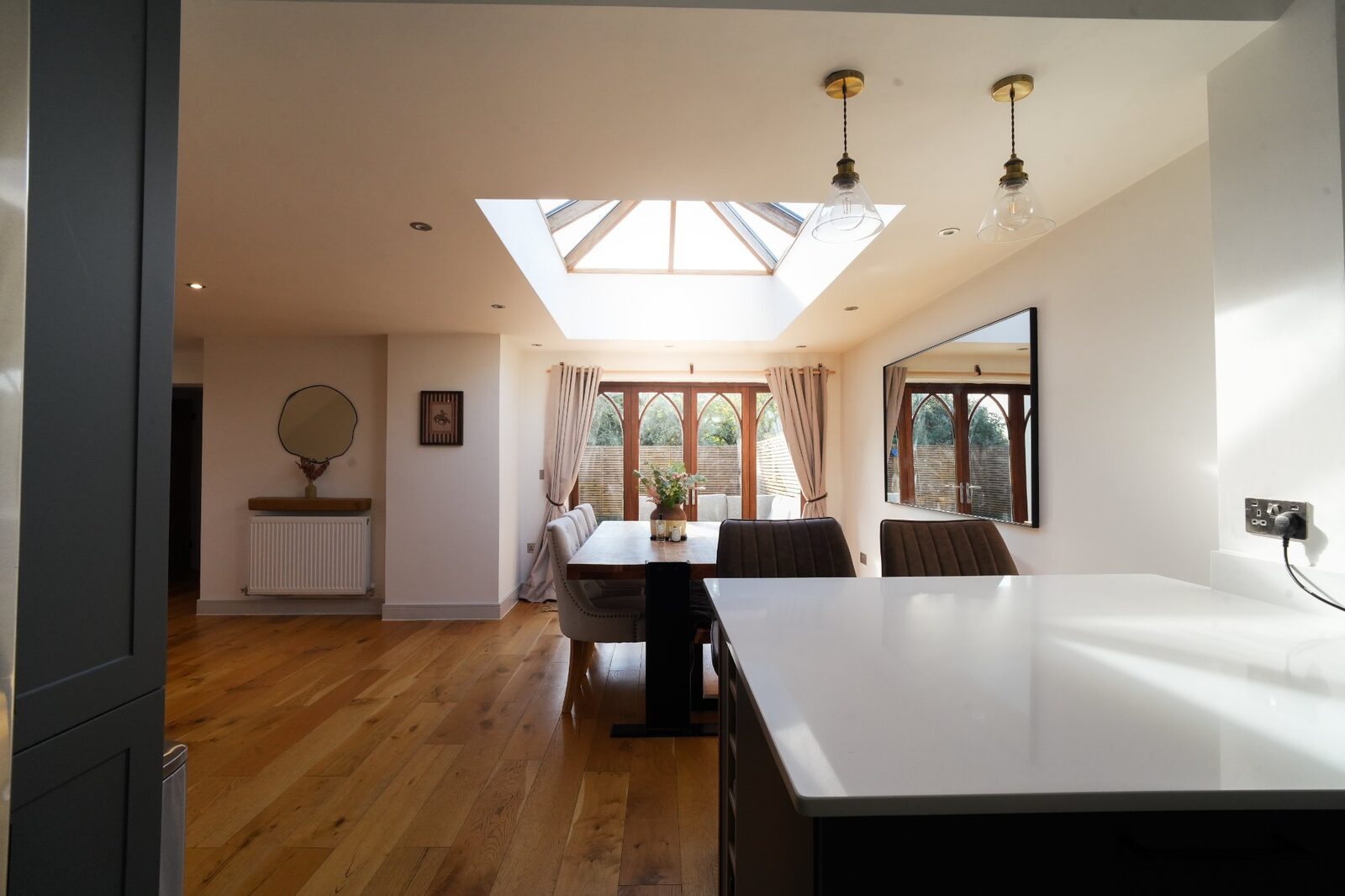 Kitchen to dining room wide view with lantern roof